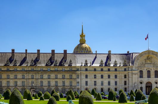 pexels-photo-12852654-12852654 A captivating view of Les Invalides with its dazzling dome under a clear blue sky in Paris.